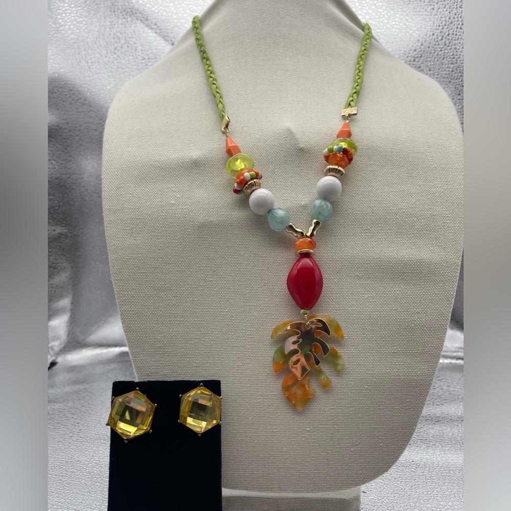 Lot of 2 pieces of costume jewelry. Earrings and necklace set.